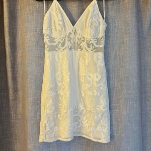 White Lulu’s sequin mini dress with straps. Bride dress for bachelorette!